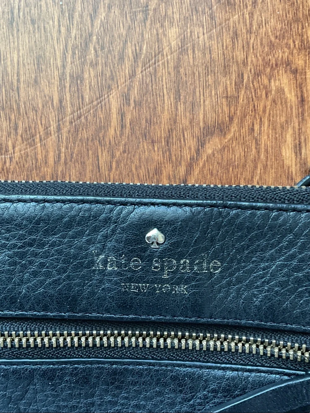kate spade black leather zip wristlet with gold hardware